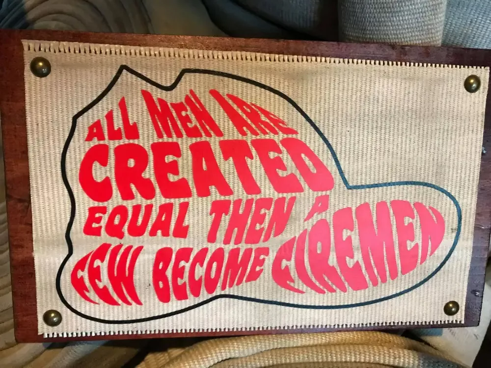 All Men are Created Equal Fire Hose Sign