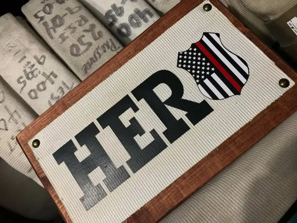 Fire Hose Sign with HERO and thin red line flag badge